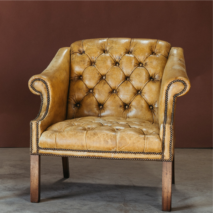 Pair of Gold Vintage Leather Tufted Chairs